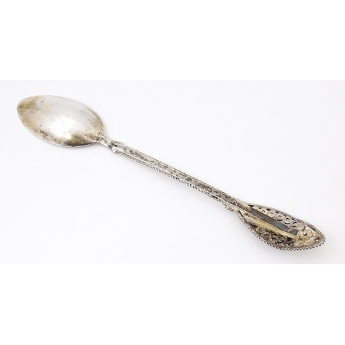 494 - A Continental .830 silver soon with filigree decoration to handle. Indistinctly marked. Possibly Sca... 