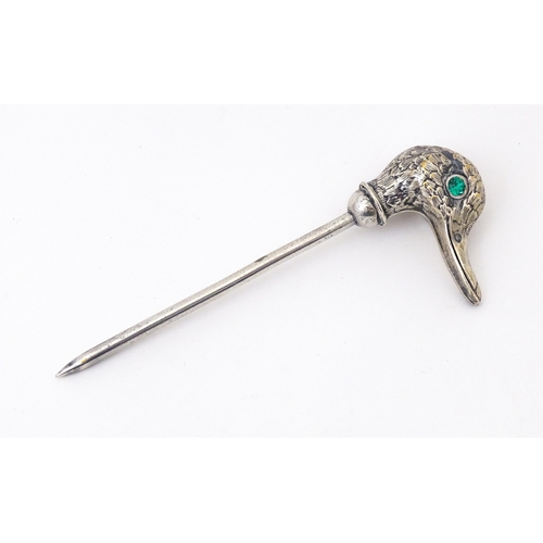 561 - A silver plate skewer / place card holder , the top surmounted by a ducks head. Approx 5 1/2