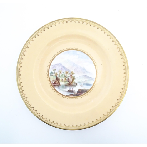 100 - Three hand painted plates depicting landscape scenes, to include a seascape with ships / boats, a la... 