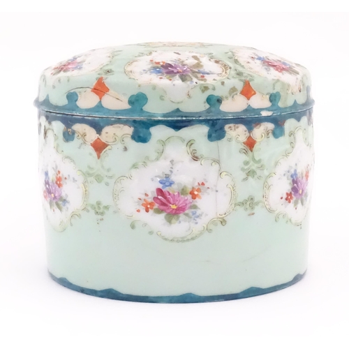 101 - A  Continental pot and cover decorated with hand painted floral vignettes. Approx. 4