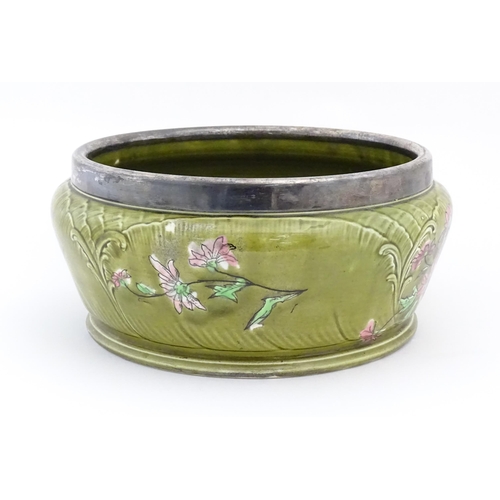 105 - A German Imperial Bonn shallow planter with silver plate rim, the body with floral decoration. Marke... 