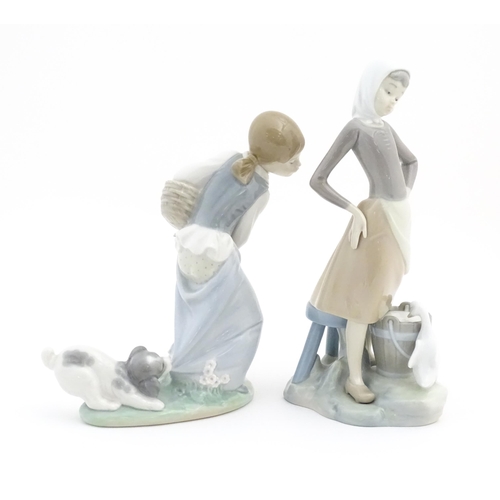 121 - Two Lladro figures comprising Girl with Milk Pail, no. 4682, and Naughty Dog, 4982. Marked under. La... 