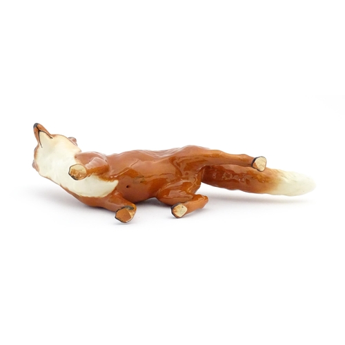 125 - A Beswick model of a standing fox, model no. 1016A. Marked under. Approx. 5