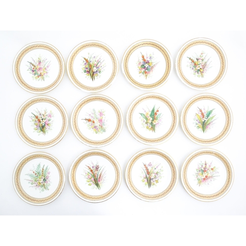 129 - A Royal Worcester part dessert service with hand painted botanical / floral and foliate sprays, to i... 