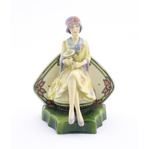 152 - A Kevin Francis limited edition figure Charlotte Rhead. Marked under, no. 582/950. Approx. 8 1/4