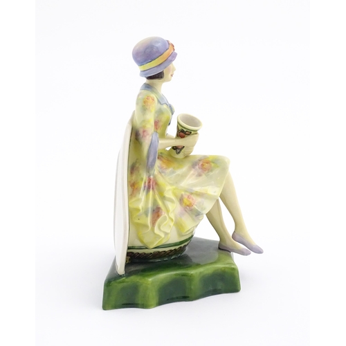 152 - A Kevin Francis limited edition figure Charlotte Rhead. Marked under, no. 582/950. Approx. 8 1/4