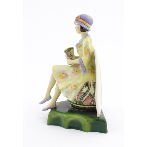 152 - A Kevin Francis limited edition figure Charlotte Rhead. Marked under, no. 582/950. Approx. 8 1/4