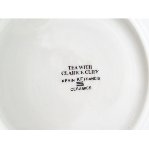 153 - A Kevin Francis limited edition figure Tea with Clarice Cliff. Marked under, no. 647/2000. Approx. 8... 