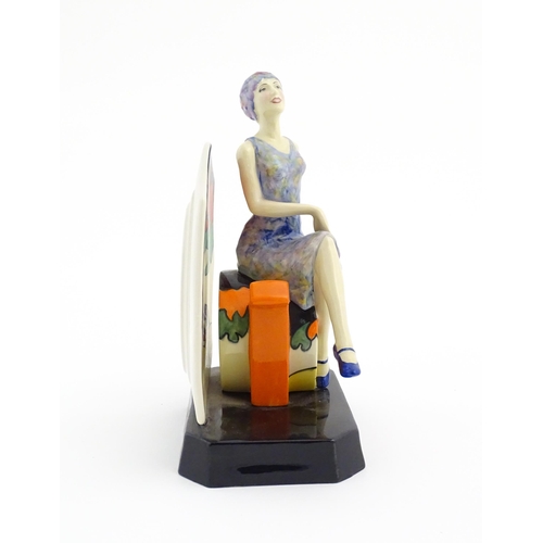 153 - A Kevin Francis limited edition figure Tea with Clarice Cliff. Marked under, no. 647/2000. Approx. 8... 