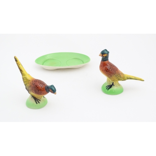 154 - A Carlton Ware cruet on stand, the salt and pepper 
modelled as pheasants. Pheasants approx. 3 3/4