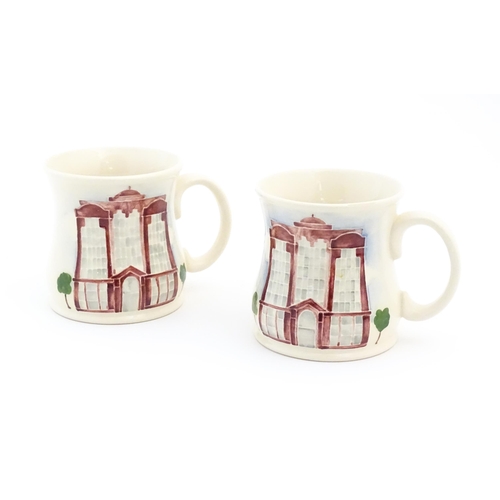 158 - Two commemorative Moorcroft mugs depicting Beaufort House. Marked under Moorcroft Richards Butler Be... 