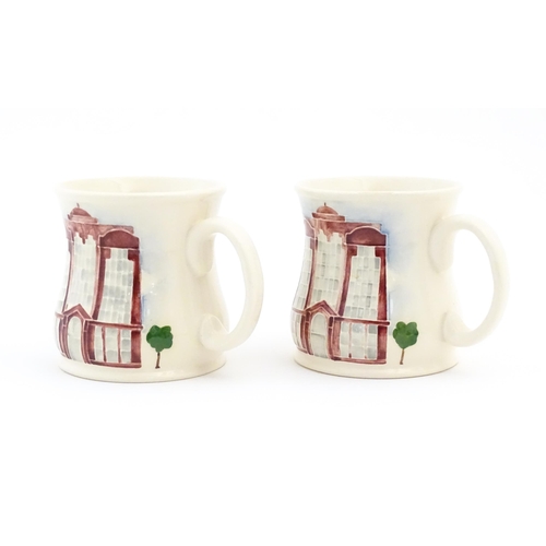 158 - Two commemorative Moorcroft mugs depicting Beaufort House. Marked under Moorcroft Richards Butler Be... 