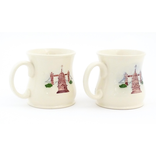 158 - Two commemorative Moorcroft mugs depicting Beaufort House. Marked under Moorcroft Richards Butler Be... 