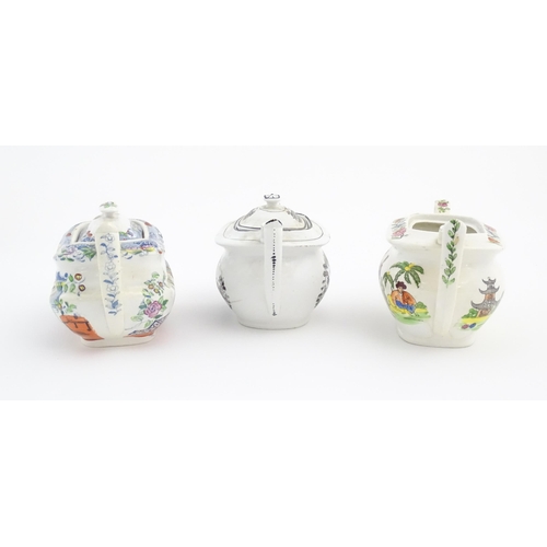 166 - Three London shape teapots, two with chinoiserie style decoration, the other with bat ware style dec... 