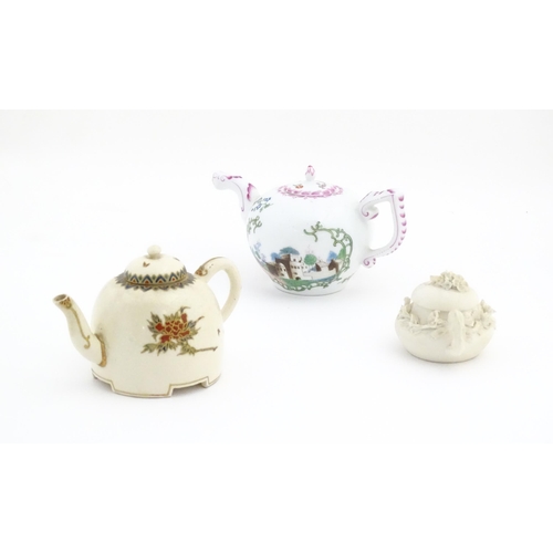 180 - Three miniature / small teapots comprising a bisque miniature teapot with applied flowers, a H M Wil... 