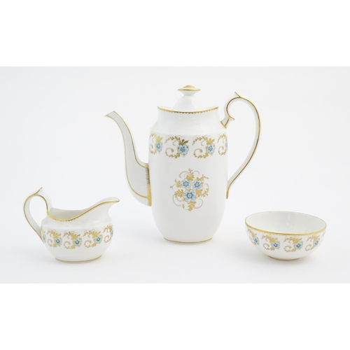 183 - A Royal Crown Derby coffee set in the Blue Pimpernel pattern, comprising coffee pot, milk jug, sugar... 