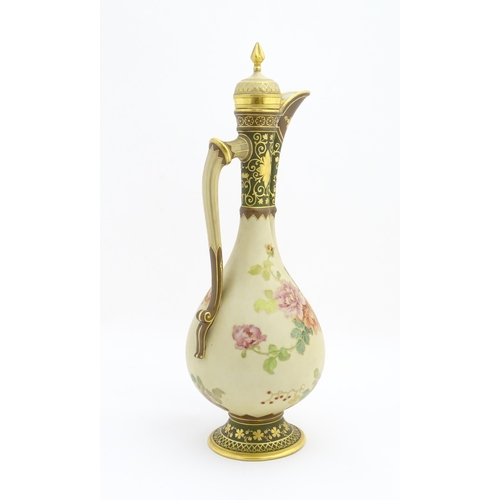 194 - A Continental Fischer & Mieg ewer and cover with floral detail and gilt highlights. Marked under. Ap... 