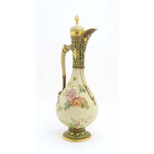 194 - A Continental Fischer & Mieg ewer and cover with floral detail and gilt highlights. Marked under. Ap... 