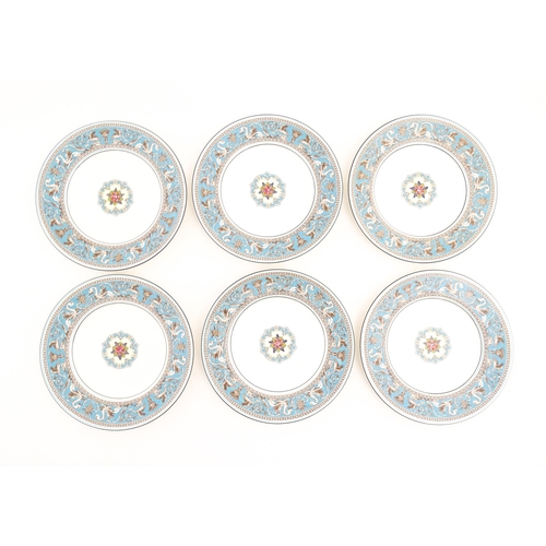 201 - A quantity of Wedgwood tea / dessert wares in the Florentine pattern to include plates, cups and sau... 