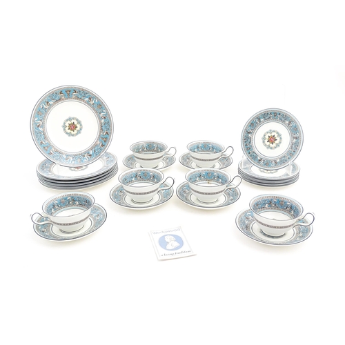 201 - A quantity of Wedgwood tea / dessert wares in the Florentine pattern to include plates, cups and sau... 