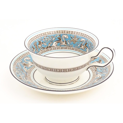 201 - A quantity of Wedgwood tea / dessert wares in the Florentine pattern to include plates, cups and sau... 