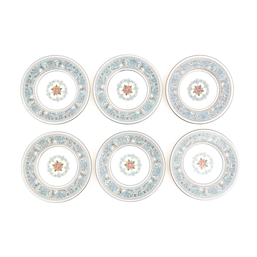 201 - A quantity of Wedgwood tea / dessert wares in the Florentine pattern to include plates, cups and sau... 