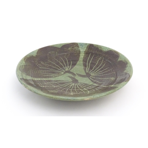 83 - A studio pottery dish by Sybil Finnemore for Yellowsands Pottery with leaf / petal decoration. Bears... 