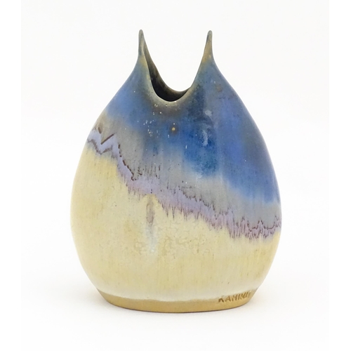 87 - A Greek studio pottery vase by Kamini with asymmetric drip glaze. Impressed marks lower. Approx. 8 1... 