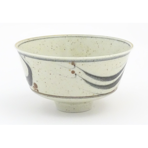 96 - A studio pottery footed bowl with brushwork detail by Derek Clarkson (1928-2013). Makers mark to foo... 