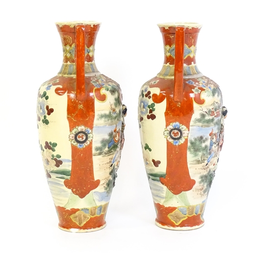 198 - A pair of Japanese satsuma vases with shaped handles, decorated with figures dancing in a landscape,... 