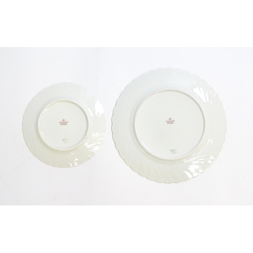 202 - A quantity of Haviland Limoges dinner wares in the Bergere pattern to include plates, serving dishes... 