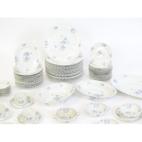 202 - A quantity of Haviland Limoges dinner wares in the Bergere pattern to include plates, serving dishes... 