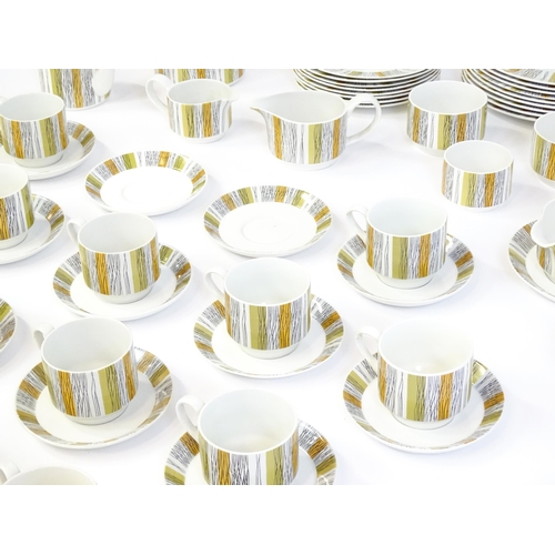 205 - A quantity of Midwinter dinner wares in the Sienna pattern to include plates, serving dishes / turee... 