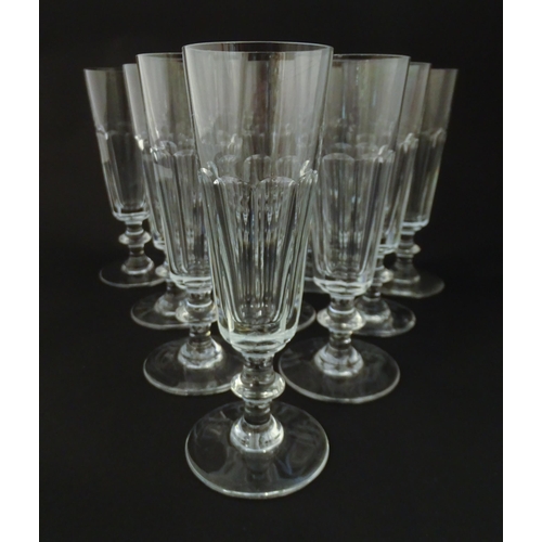 209 - Ten Saint Louis crystal champagne flutes, marked under ' St Louis Cristal France' Approx 7 1/4