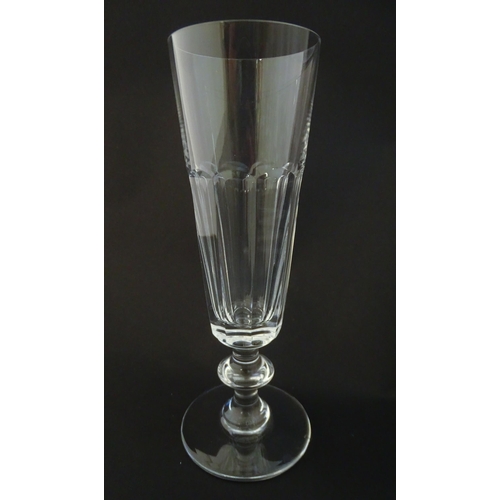 209 - Ten Saint Louis crystal champagne flutes, marked under ' St Louis Cristal France' Approx 7 1/4