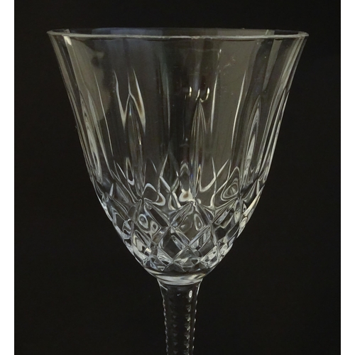 210 - A set of 6 cut crystal wine glasses Approx 7 1/4