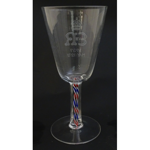 228 - An Edward VIII  commemorative coronation pedestal drinking glass with blue, white and red coloured t... 