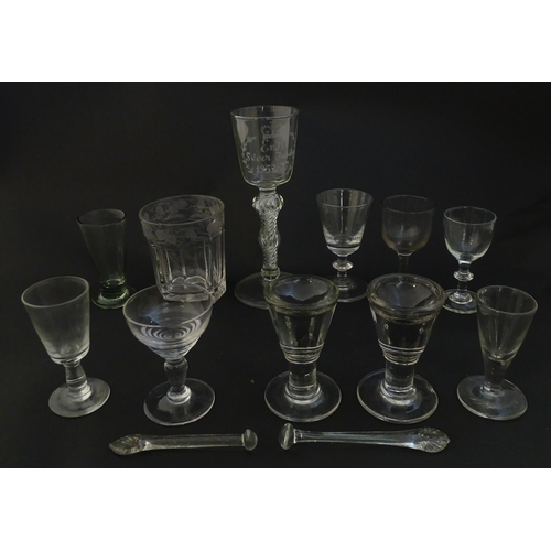 256 - A quantity of Georgian and later glassware to include various drinking glasses, toastmaster glass, p... 