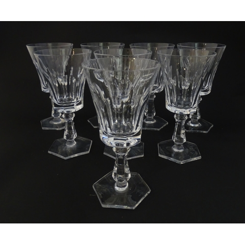 257 - Eight pedestal drinking glasses on a hexagonal foot. Approx 6 1/4