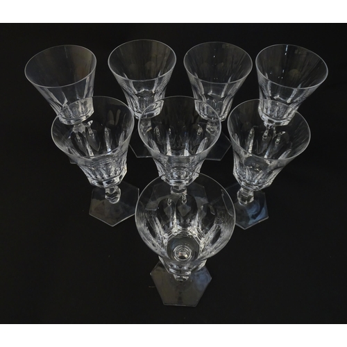 257 - Eight pedestal drinking glasses on a hexagonal foot. Approx 6 1/4