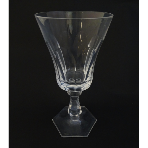 257 - Eight pedestal drinking glasses on a hexagonal foot. Approx 6 1/4