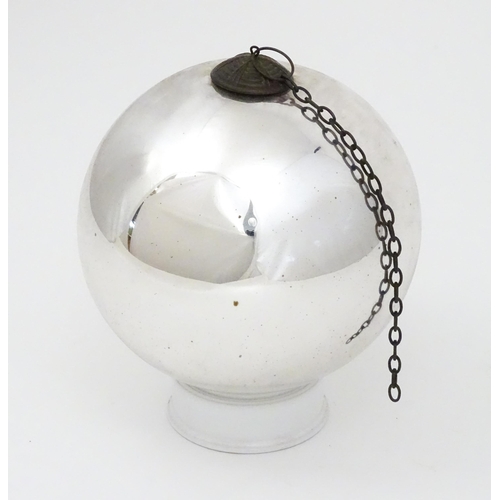 258 - Witch ball : A mirrored glass witches ball with chain hanger. Approx 8