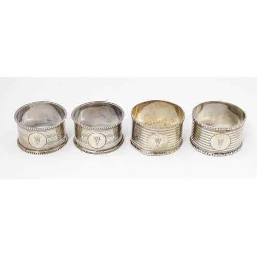 269 - Two silver napkin rings hallmarked Birmingham 1918 maker Martin Hall & Co ltd. Together with two nap... 