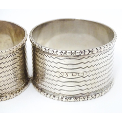 269 - Two silver napkin rings hallmarked Birmingham 1918 maker Martin Hall & Co ltd. Together with two nap... 