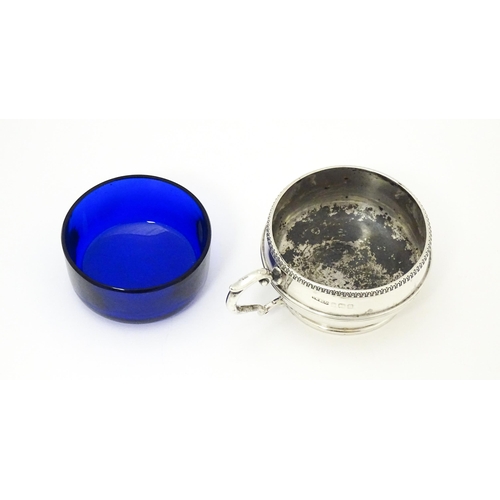 273 - A silver salt with blue glass liner hallmarked Birmingham 1919 maker Collingwood & Sons Ltd.