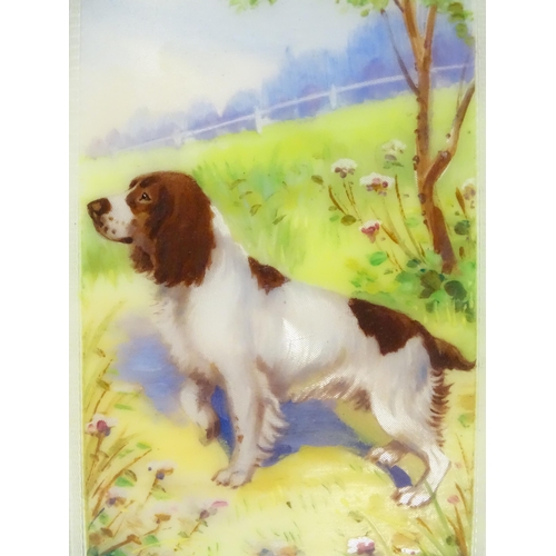 275 - An Art Deco silver cigarette case with enamel Spaniel dog decoration, engine turned detail and gilde... 