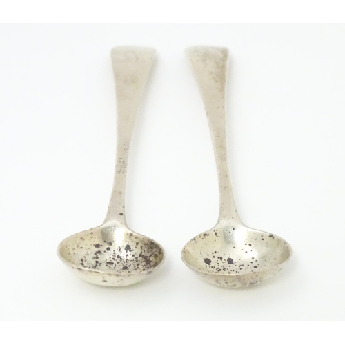 277 - A pair of Geo III silver salt spoons with engraved squirrel armorials. Hallmarked London 1808 maker ... 