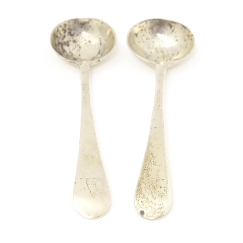 277 - A pair of Geo III silver salt spoons with engraved squirrel armorials. Hallmarked London 1808 maker ... 