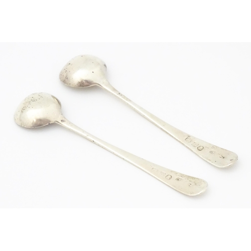 277 - A pair of Geo III silver salt spoons with engraved squirrel armorials. Hallmarked London 1808 maker ... 