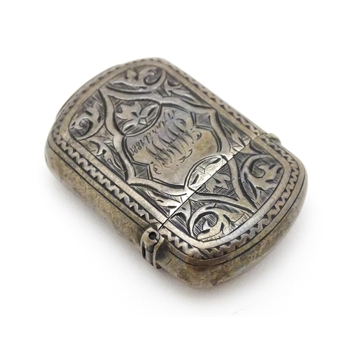 281 - A Victorian silver vesta case with engraved decoration. Maker Hillard & Thomason 1 1/2